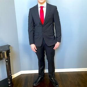 Black Calvin Klein men’s suit. Worn only 1 hour-like new.Includes pants & jacket